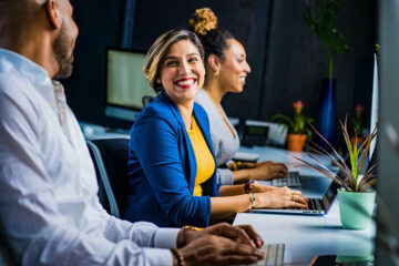 Lady in office smiling